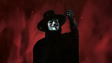 V for Vendetta figure wearing a Guy Fawkes mask and wide-brim hat, black cloak and raised fist against a red smoky background — 5K Ultra HD PC desktop wallpaper/background.
