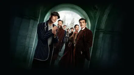 Young Sherlock cast in Victorian coats standing beneath a stone arch with a foggy city skyline and moody green lighting — 4K Ultra HD PC desktop wallpaper/background.