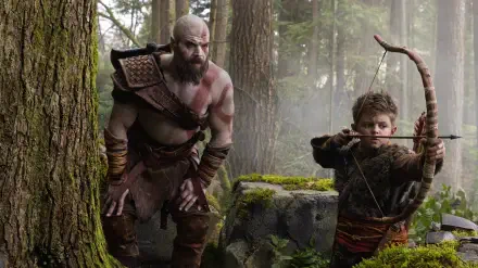 God of War (TV Show) 2K Quad HD PC desktop wallpaper — rugged bearded warrior and young archer practicing in a misty, moss-covered forest.