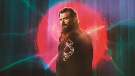 Foundation-themed 4K Ultra HD PC desktop wallpaper: bearded man in dark cloak stands before a glowing red orb with teal neon streaks, moody sci-fi atmosphere.