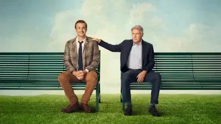Shrinking 4K Ultra HD PC Desktop Wallpaper and Background: two men sit on a park bench on green grass beneath a blue sky, an older man gently rests his hand on the younger man's shoulder.