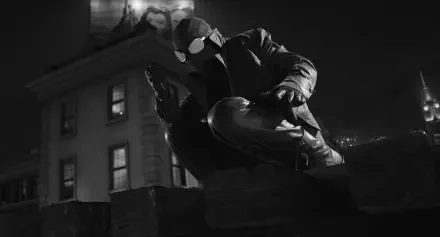 Black-and-white 2K Quad HD desktop wallpaper of Spider-Man Noir (2026) from the TV show, crouched on a shadowy rooftop at night in moody noir lighting.