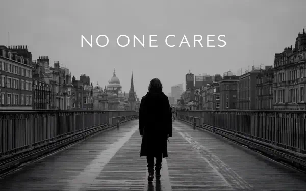 Monochrome 4K Ultra HD PC desktop wallpaper/background showing a lone figure walking away on a city bridge beneath bold NO ONE CARES text.