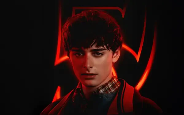 Stranger Things 5K Ultra HD PC desktop wallpaper: moody portrait of a teenage character with a backpack and a glowing red 5 emblem behind him on a dark background.