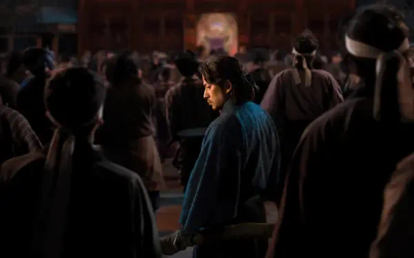 TV show Last Samurai Standing still: lone samurai in blue robe turns amid a shadowed, crowded hall, dramatic cinematic lighting — 4K Ultra HD PC desktop wallpaper/background.