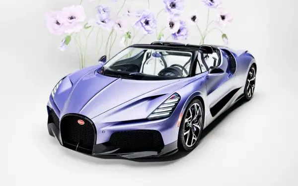 5K Ultra HD desktop wallpaper of a metallic lavender Bugatti W16 Mistral hypercar, a luxury car shown in three-quarter front view against a soft floral background.