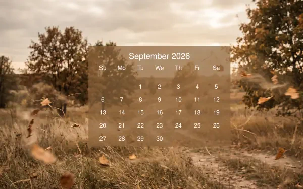 September 2026 calendar overlaid on a golden autumn field with trees and drifting leaves — 5K Ultra HD PC desktop wallpaper and background.