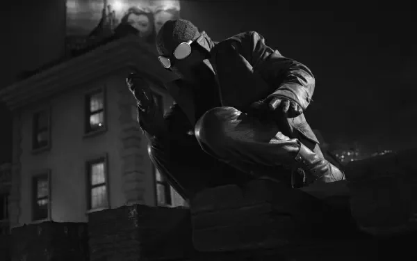 Black-and-white 2K Quad HD desktop wallpaper of Spider-Man Noir (2026) from the TV show, crouched on a shadowy rooftop at night in moody noir lighting.
