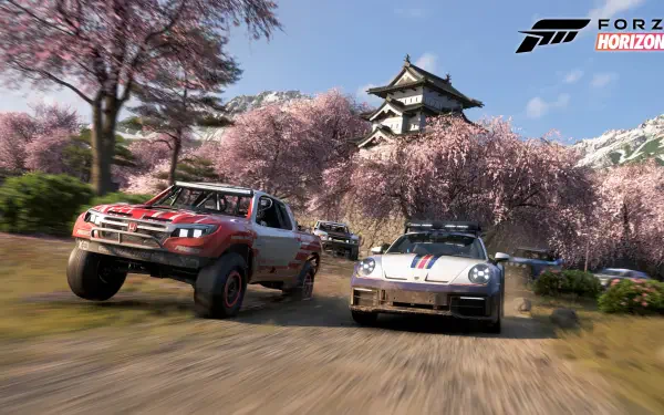 Forza Horizon 6 video game 4K Ultra HD PC desktop wallpaper: rally truck and sports car racing on a dirt road past cherry blossoms with a Japanese castle and blue sky.