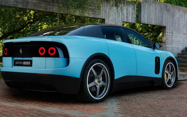 Light blue Ferrari Luce sports vehicle parked on wet brick, rear three-quarter view — 4K Ultra HD PC desktop wallpaper and background.