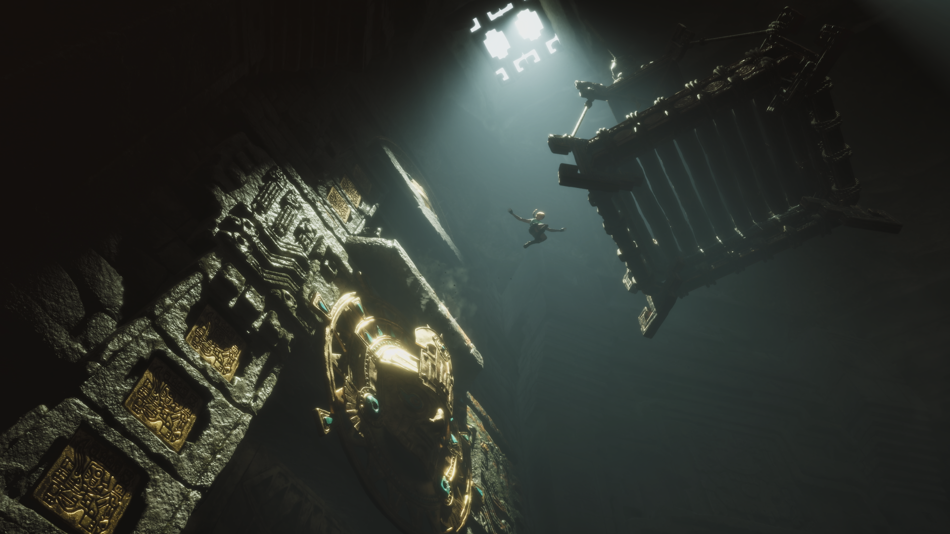 4K Ultra HD PC desktop wallpaper from the video game Tomb Raider: Legacy of Atlantis — Lara Croft dives toward a light in a dark underwater temple beside a giant carved stone face.