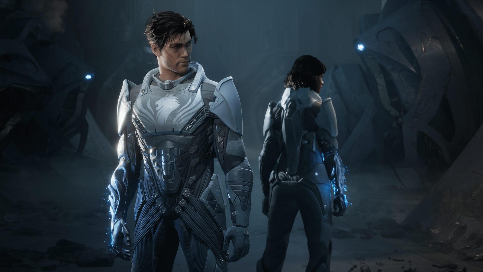Exodus (2027) video game 4K Ultra HD PC wallpaper: two armored futuristic operatives stand back-to-back in a dim, blue-lit cavern, their glowing combat suits and tech visors prominent.