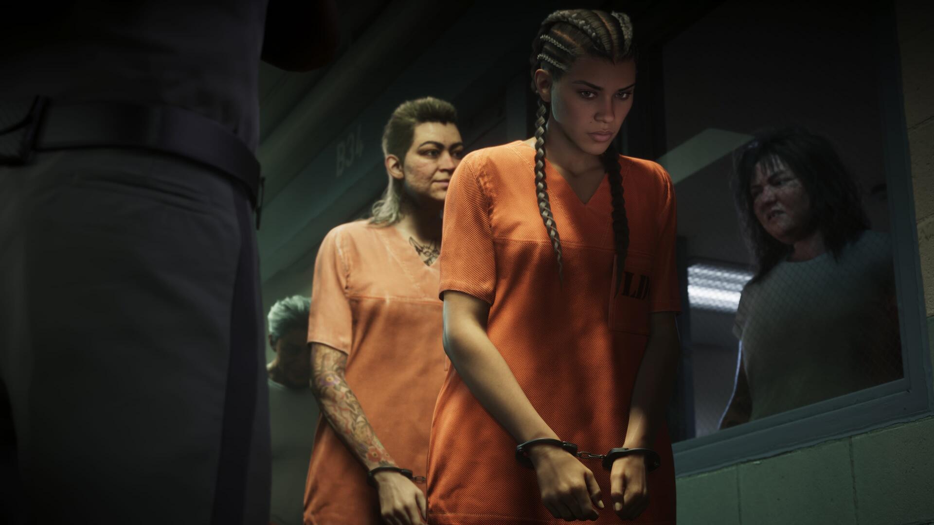 4K Ultra HD PC desktop wallpaper: Grand Theft Auto VI scene showing Lucia Caminos in an orange jumpsuit, handcuffed and escorted through a dim prison corridor (video game background).