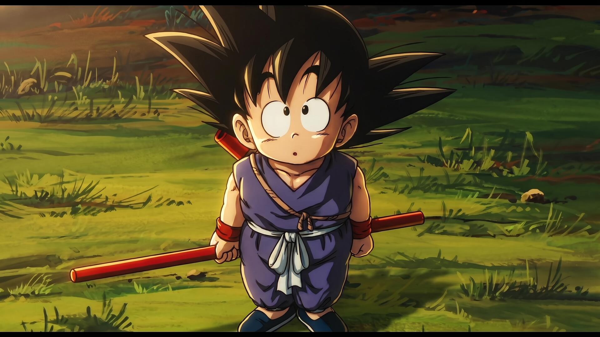 HD PC desktop wallpaper of kid Goku from Dragon Ball: anime-style scene of him on grass at sunset holding his red Power Pole, looking up with wide eyes.