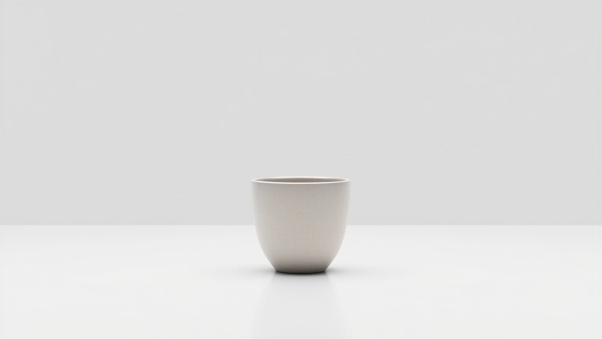 Clean minimal 5K Ultra HD PC desktop wallpaper and background: single white ceramic cup centered on a white surface with a soft gray backdrop.
