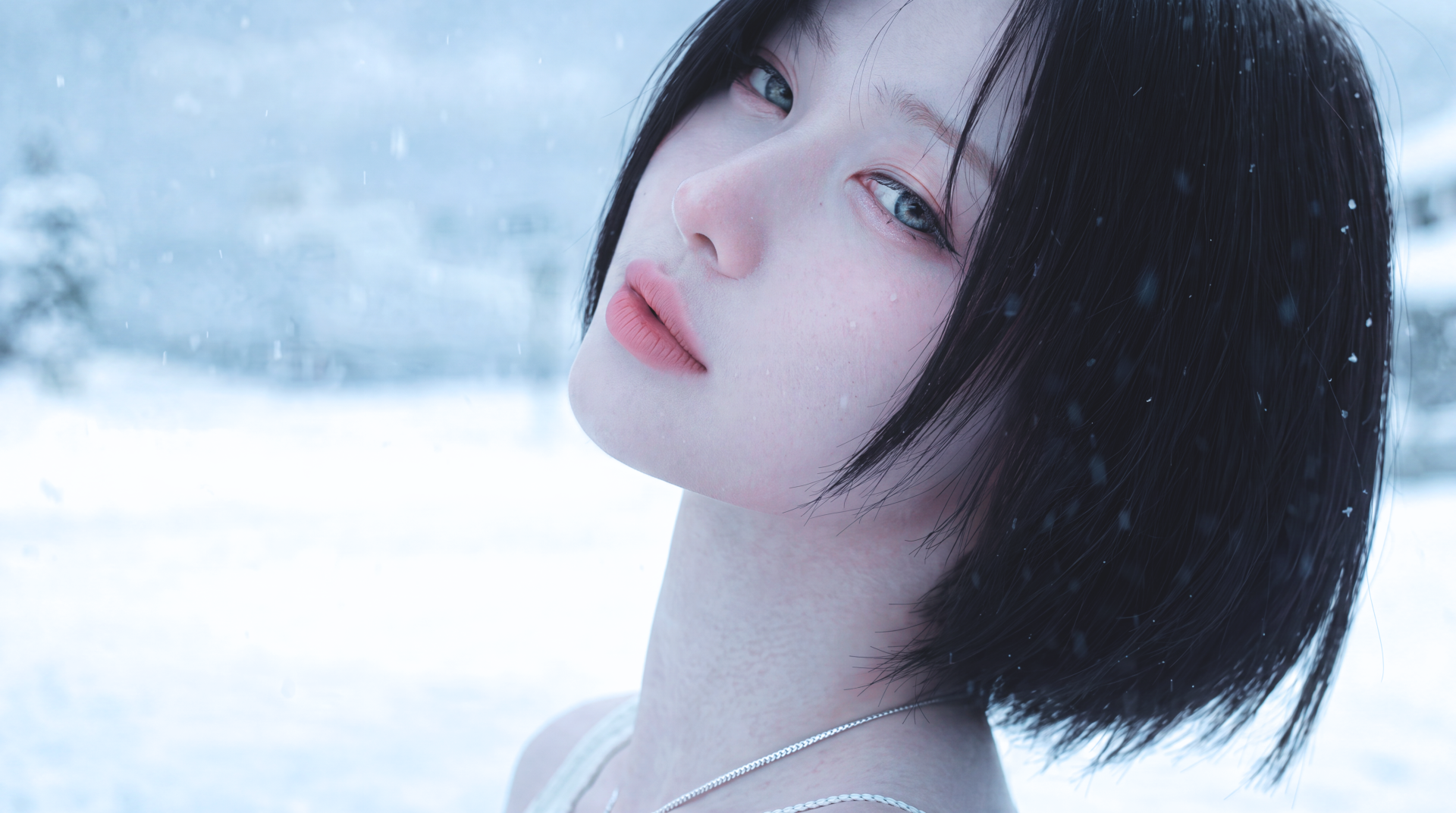 K-pop–styled Japanese model with short black hair gazes over her shoulder as snow falls around her, soft pale tones in a 5K Ultra HD desktop wallpaper.