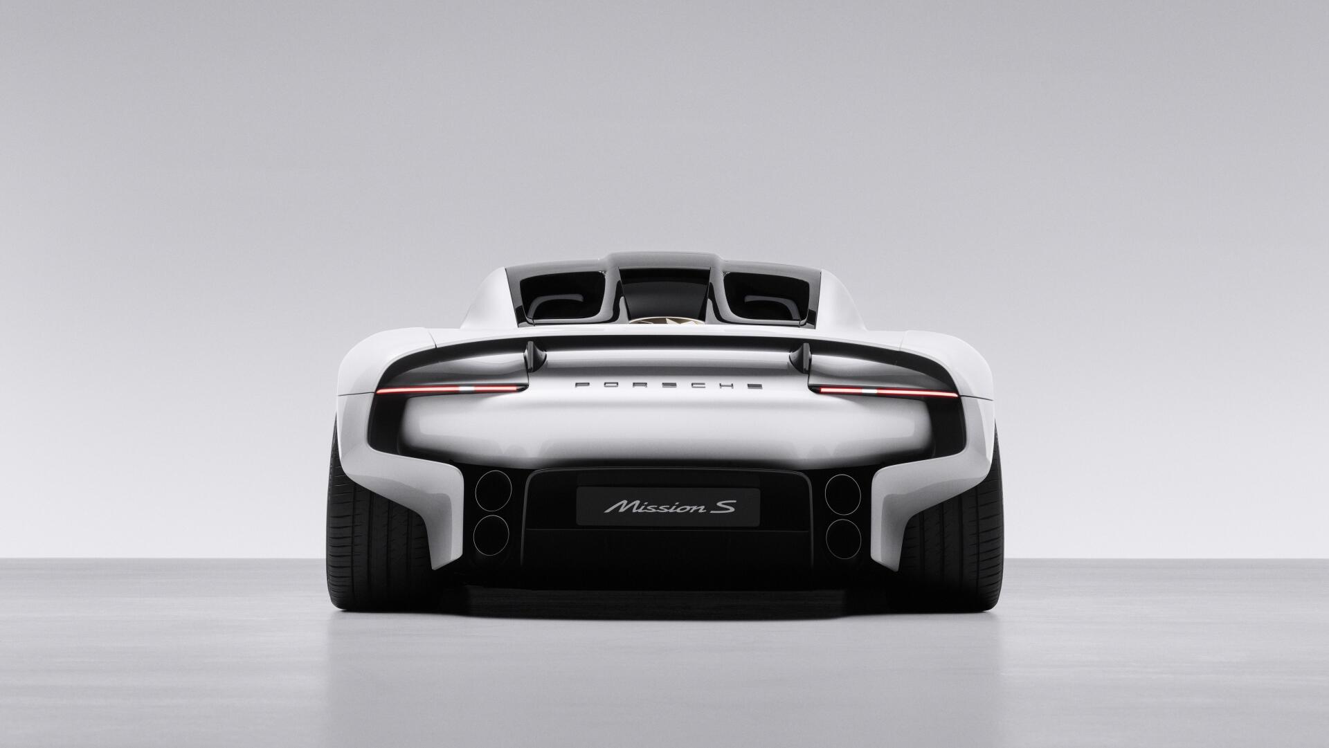 Rear view of a white Porsche Mission S supercar in a minimalist studio, featured in a 5K Ultra HD PC desktop wallpaper.