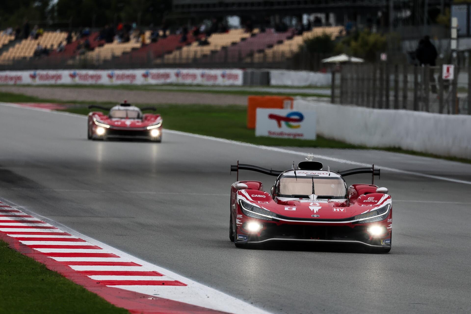 Toyota TR010 Hybrid race cars speeding along the circuit in the FIA World Endurance Championship, 5K Ultra HD desktop wallpaper.