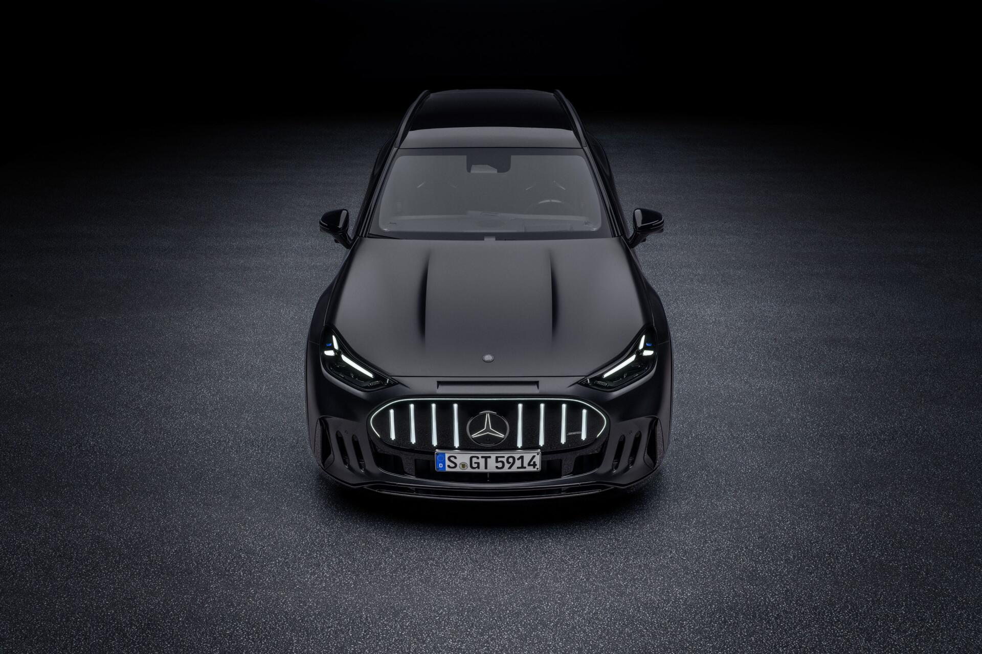 Mercedes-AMG GT SUV viewed from the front in a dark studio, 2K Quad HD PC desktop wallpaper and background.