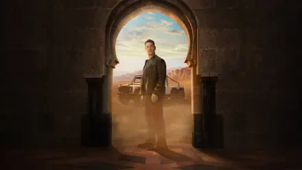 Matchbox (Movie) 4K Ultra HD PC desktop wallpaper: lone man framed in a sunlit stone archway, vintage car behind him and a dusty desert canyon stretching into the horizon.