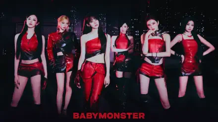 BABYMONSTER K-pop girl group in red stage outfits against a city night skyline, logo at bottom — 5K Ultra HD PC desktop wallpaper, YG Entertainment.
