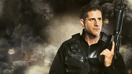 S.W.A.T. Under Siege HD PC desktop wallpaper and background: stoic SWAT officer in tactical vest holding a rifle before a smoky, dramatic backdrop.