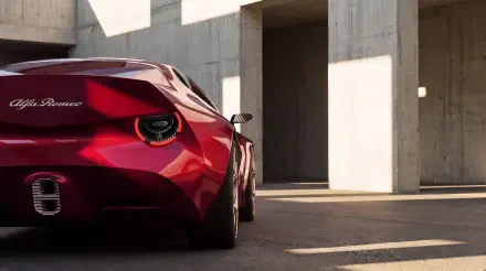 Red Alfa Romeo Cuorerosso concept sports car against modern concrete architecture, featured in an HD desktop wallpaper background.