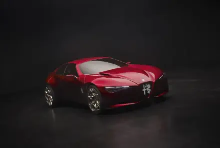 Red Alfa Romeo Cuorerosso concept sports car on a dark studio backdrop, featured in an HD PC desktop wallpaper.