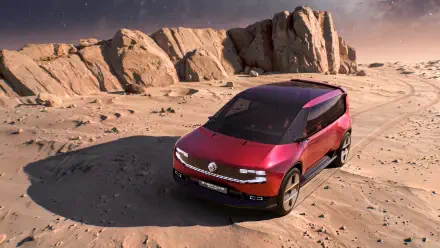 Red Renault E-Space SUV on a rocky desert landscape, featured in an HD desktop wallpaper.