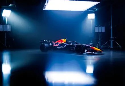 Red Bull Racing RB22 Formula One race car in a dramatic blue-lit studio, featured in a 4K Ultra HD PC desktop wallpaper and background.
