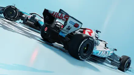 Haas F1 Team’s VF-26 Formula 1 race car on a blue track, featured in an HD PC desktop wallpaper.