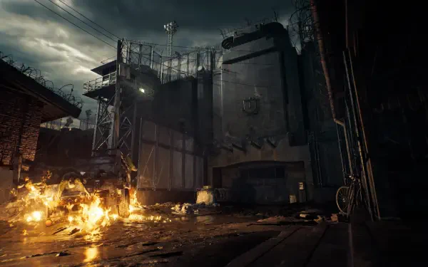 Moody, rain-soaked prison yard with burning wreckage — Resident Evil Veronica scene from the Resident Evil video game; 4K Ultra HD PC desktop wallpaper and background.
