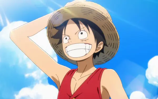 HD PC desktop wallpaper: Monkey D. Luffy from One Piece smiling broadly in his straw hat against a bright blue sky