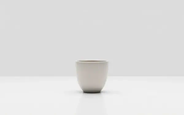 Clean minimal 5K Ultra HD PC desktop wallpaper and background: single white ceramic cup centered on a white surface with a soft gray backdrop.