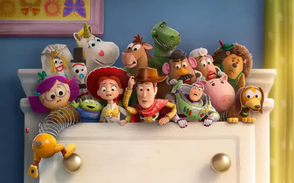 Toy Story 5 image: Toy Story characters peeking over a dresser, colorful group shot — 4K Ultra HD PC desktop wallpaper and background.