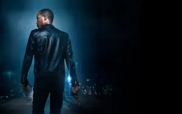 24: Legacy — 4K Ultra HD PC desktop wallpaper: lone man in a leather jacket, back to viewer, holding a handgun, bathed in cool blue city lights against a dark urban skyline.