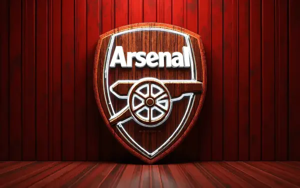 Arsenal F.C. logo shield with cannon in neon wood against red paneling and floor — soccer Sports 4K Ultra HD PC desktop wallpaper background.