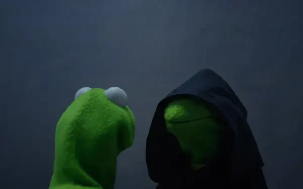 Evil Kermit meme: green Kermit puppet confronts his hooded dark self in a moody scene, rendered as a 4K Ultra HD PC desktop wallpaper and background.