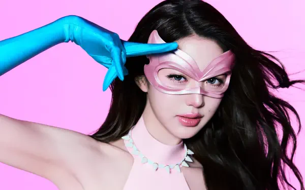 IVE’s Jang Wonyoung in a striking pink portrait for the “Looks Can Kill” 4K Ultra HD PC desktop wallpaper and background.