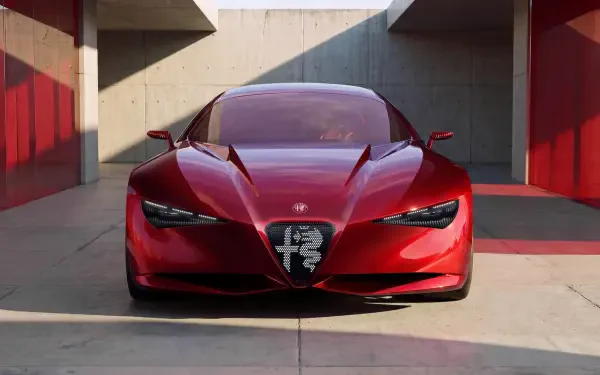HD desktop wallpaper of the red Alfa Romeo Cuorerosso concept sports car, shown head-on in a modern architectural setting.