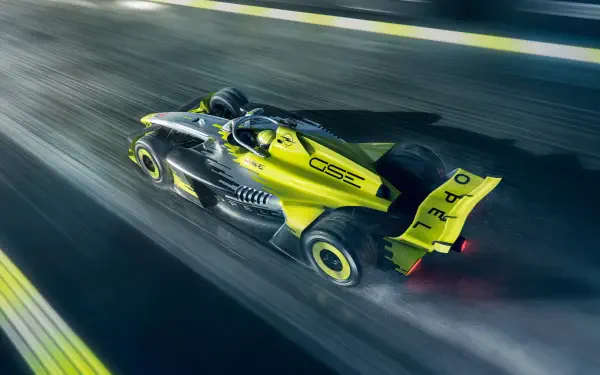 Opel GSE 27FE F1 race car speeding along a track in a 5K Ultra HD desktop wallpaper