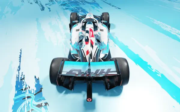 Haas F1 Team VF-26 race car viewed from above on a snowy ice track, HD desktop wallpaper and background.