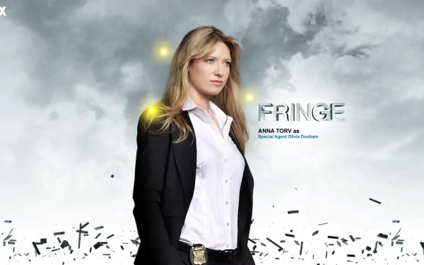 HD PC desktop wallpaper featuring Anna Torv as Olivia Dunham from the TV show Fringe against a cloudy gray background with floating particles.
