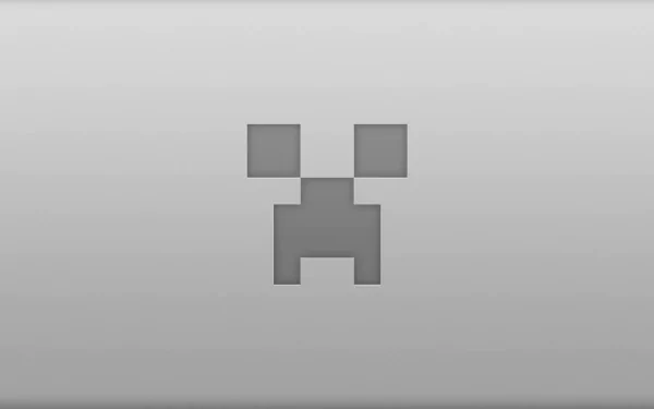 Minimalist HD PC desktop wallpaper featuring the pixelated face of a Minecraft Creeper in grayscale.