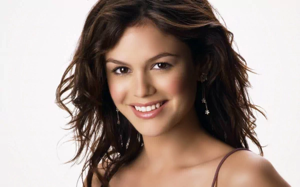 HD PC desktop wallpaper featuring a smiling celebrity Rachel Bilson with loose, wavy hair against a plain white background.