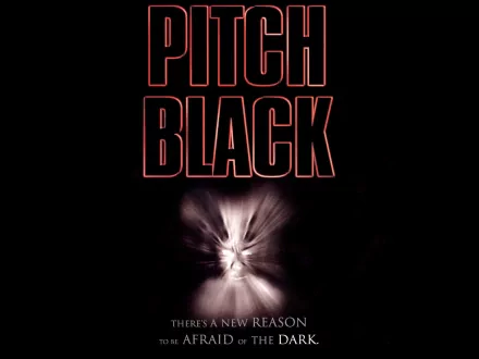 HD desktop wallpaper for Pitch Black with title text and a central light burst against a dark background.