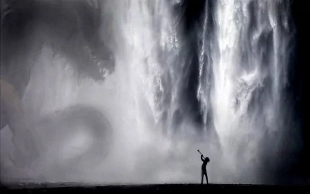 A stunning HD fantasy wallpaper featuring a lone figure facing a massive dragon near a dramatic waterfall, blending elements of adventure and magic.