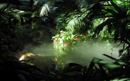 Lush jungle scene featuring vibrant plants and mist rising from a tranquil pool, captured in stunning detail. This HD wallpaper brings nature's beauty to your desktop.
