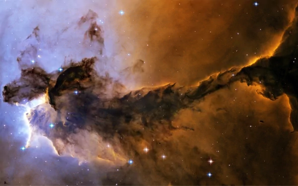 A stunning high-definition image of a nebula captured by the Hubble Space Telescope, showcasing vibrant clouds of gas and stars, representing the vast beauty of the cosmos.