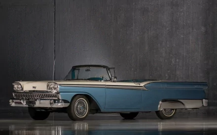 A blue 1959 Ford Fairlane 500 Galaxie Skyliner convertible showcased against a dark, textured background in an HD PC desktop wallpaper.